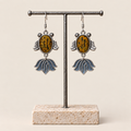 Amber Rhythm handmade fish earrings, display