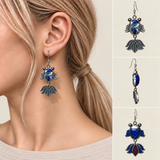 Azure Cadence handmade fish earrings, worn detail and front side reverse views
