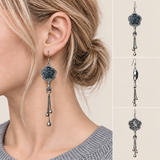 Midnight Blossom floral tassel earrings worn with the textile front facing outward, beside front, side and reverse product views.