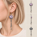 Lilac Serenade floral tassel earrings worn with the textile front facing outward, beside front, side and reverse product views.