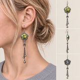 Golden Meadow floral tassel earrings worn with the textile front facing outward, beside front, side and reverse product views.