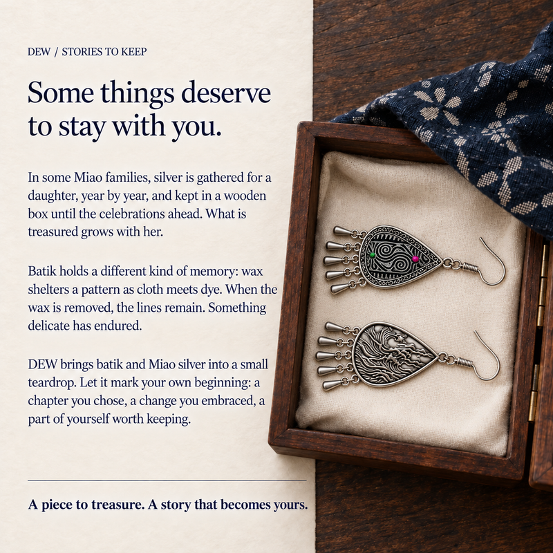 DEW story panel with Midnight Currents front and reverse resting on cream cloth in a wooden box beside dark patterned fabric.