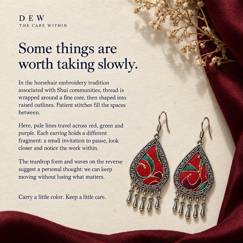 DEW craft story panel titled Some things are worth taking slowly, with Crimson Aurora earrings on textured paper beside red cloth and dried flowers.