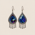 Violet Reverie teardrop earrings with differing blue, purple, black and pale green split-thread embroidery and five short drops.