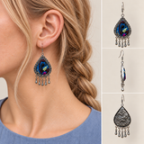 Violet Reverie earrings worn with embroidery facing outward, beside front, side and wave-relief reverse views.