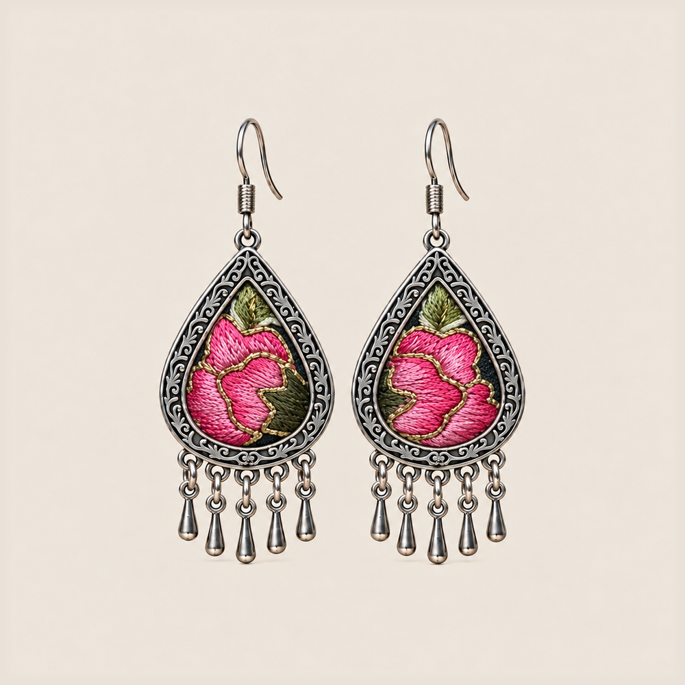 Petal Serenade teardrop earrings with pink flowers, green leaves and fine gold-colored outlines in Jing embroidery, with five short drops.