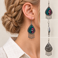 Twilight Mosaic earrings worn with geometric embroidery facing outward, beside front, side and wave-relief reverse views.