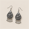 Twilight Mosaic earrings laid flat with wave-relief backs facing up and five short drops beneath each teardrop.