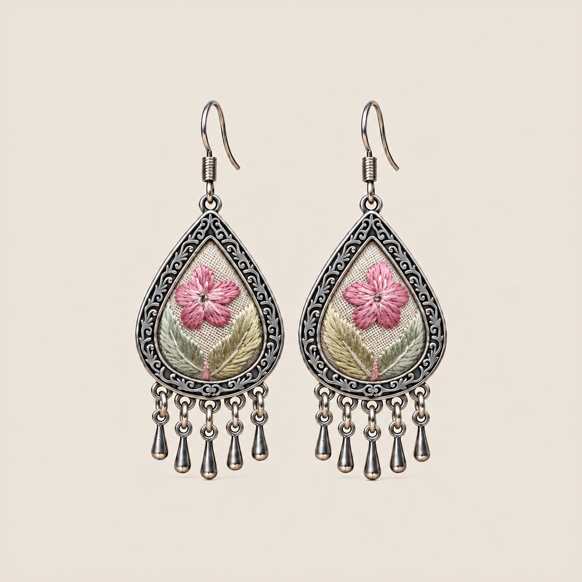 Blush Reverie teardrop earrings with pink five-petal Suzhou embroidery flowers on ivory textile and five short drops.