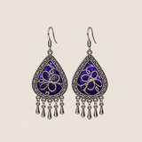 Violet Arabesque teardrop earrings with silver-white Panjin embroidery curves on purple textile and five short drops.