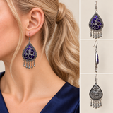 Model wearing a Violet Arabesque earring, beside front, side and wave-relief reverse views.
