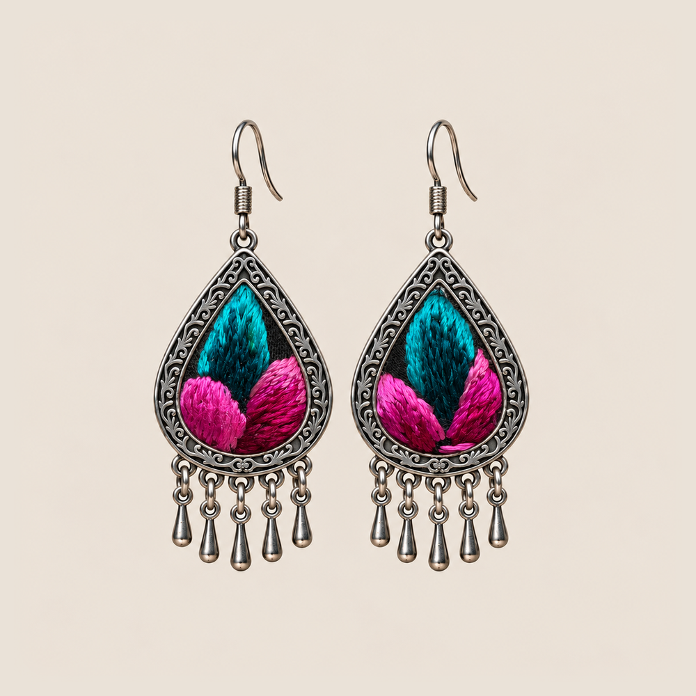 Fuchsia Tide teardrop earrings with teal upper sections and vivid pink lower sections of Songtao embroidery and five short drops.