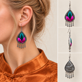 Model wearing a Fuchsia Tide earring, beside front, side and wave-relief reverse views.