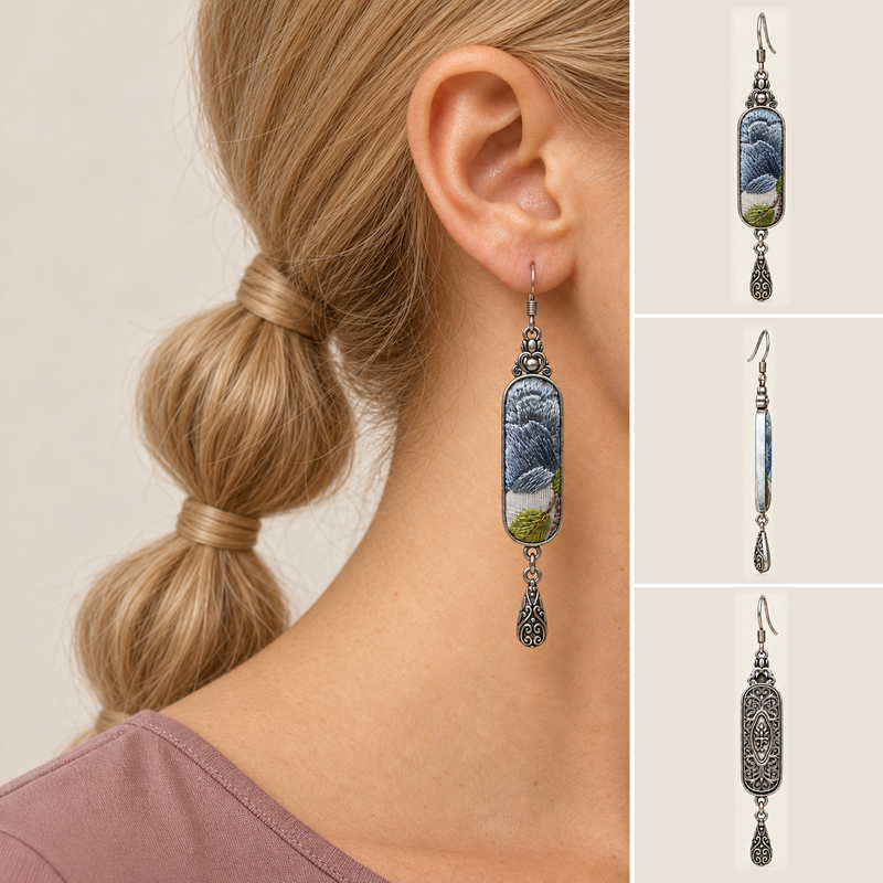 Blue Reverie earring worn with the embroidered front facing outward, beside separate front, side and reverse views.