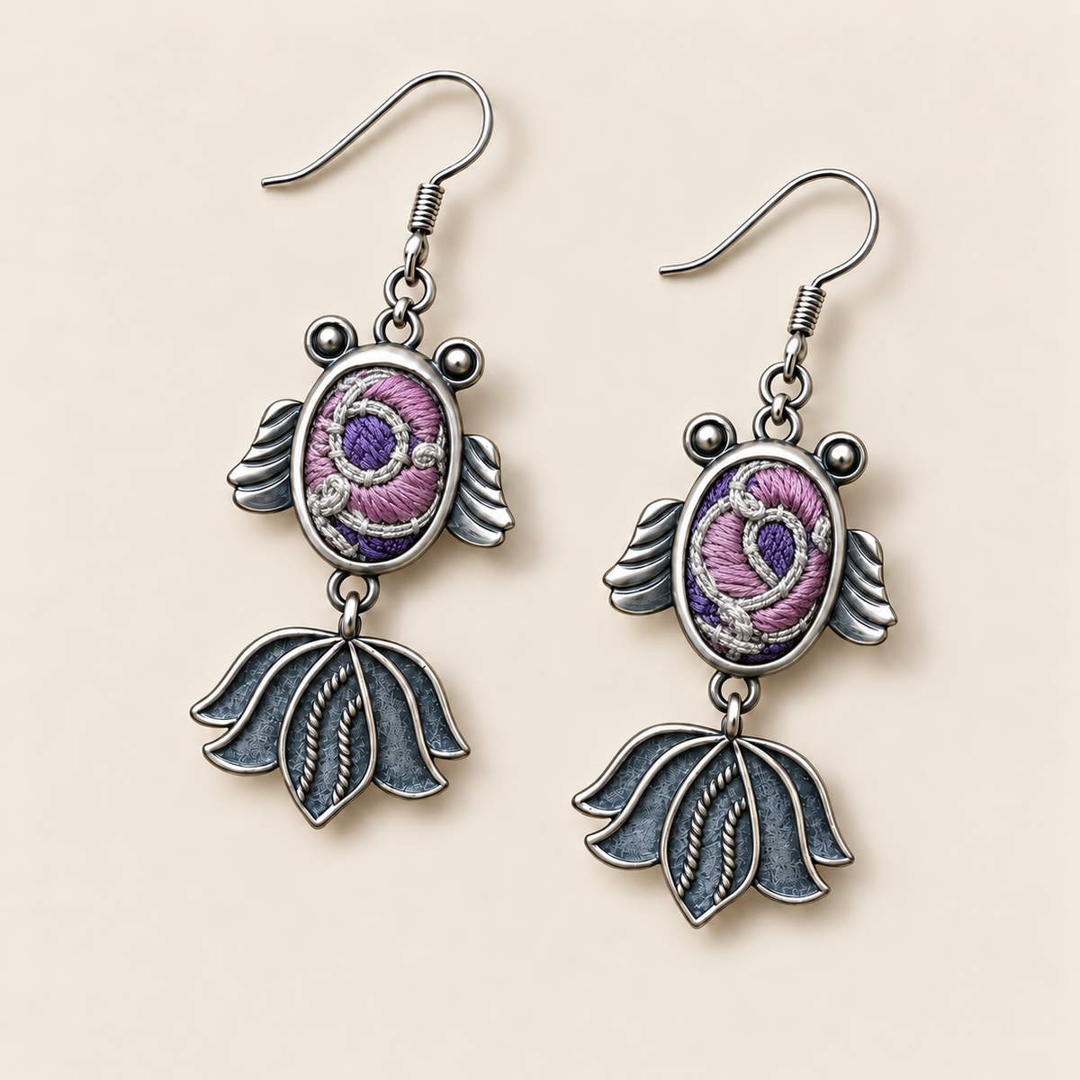 Lilac Nocturne handmade fish earrings, front flat lay