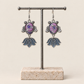 Lilac Nocturne handmade fish earrings, display