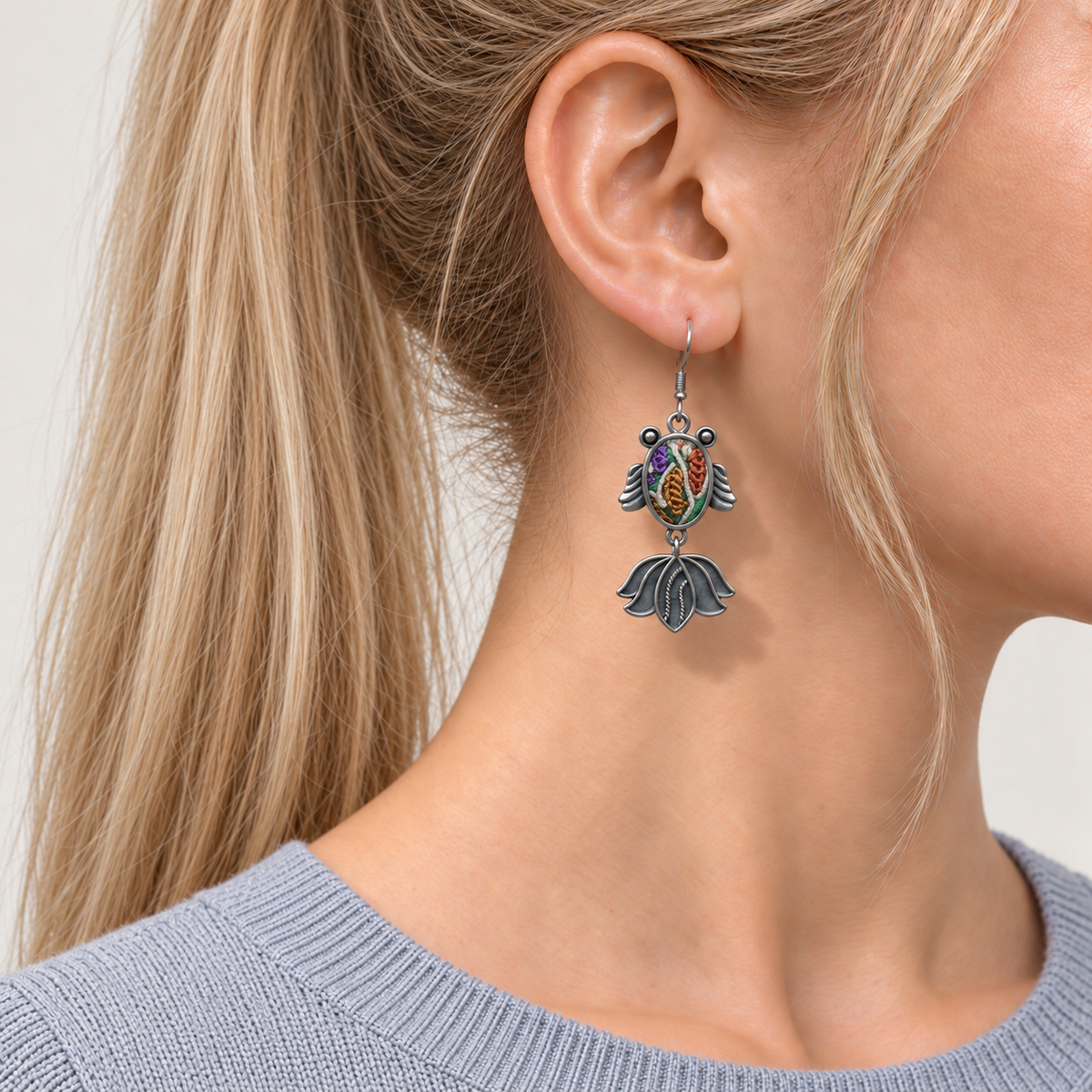 Meadow Rhapsody handmade fish earrings, front worn
