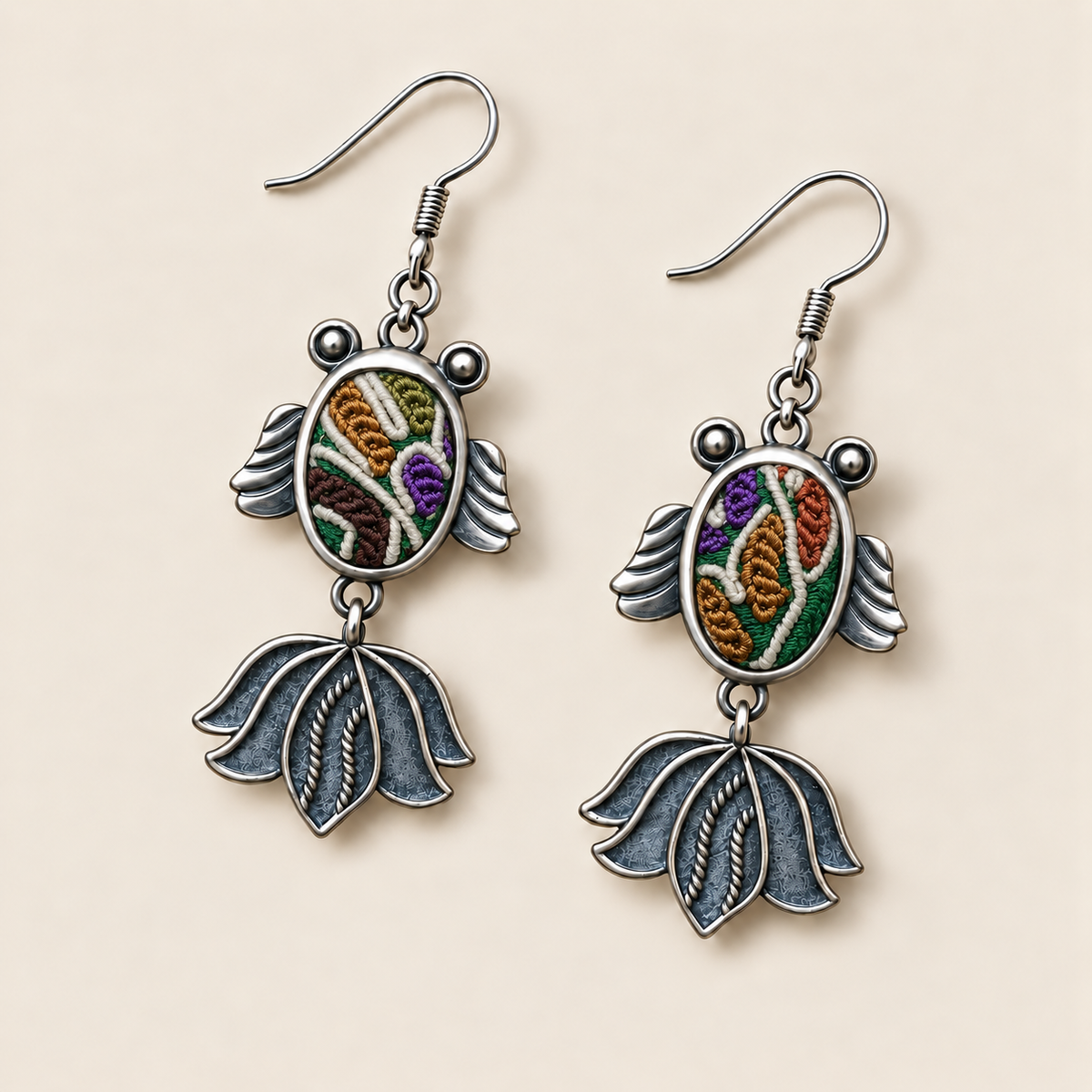 Meadow Rhapsody handmade fish earrings, front flat lay