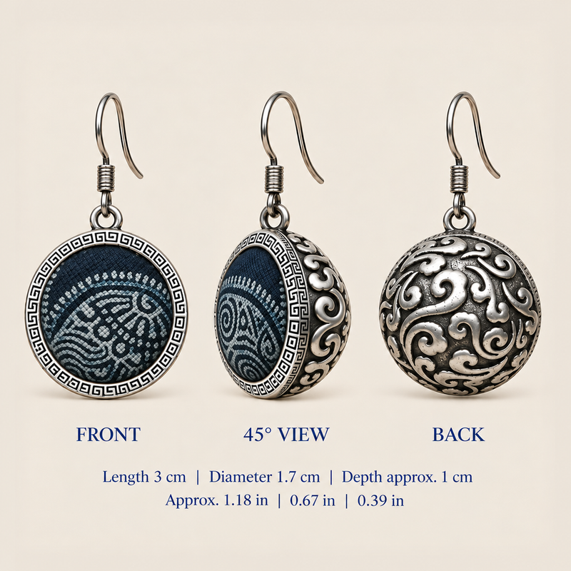 Indigo Cosmos front, 45-degree and reverse views: 3 cm length including hook, 1.7 cm diameter and approximately 1 cm overall depth.