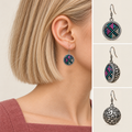 Petal Mosaic earring worn with its embroidered front facing outward, beside front, 45-degree and domed reverse views.
