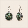 Verdant Bloom round earrings with green embroidered petals, gold-colored details, geometric rims and domed scrollwork backs.