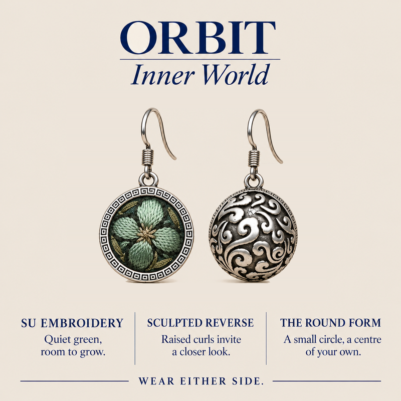 ORBIT Inner World card showing Verdant Bloom's Suzhou embroidery front and sculpted reverse, with Wear Either Side.
