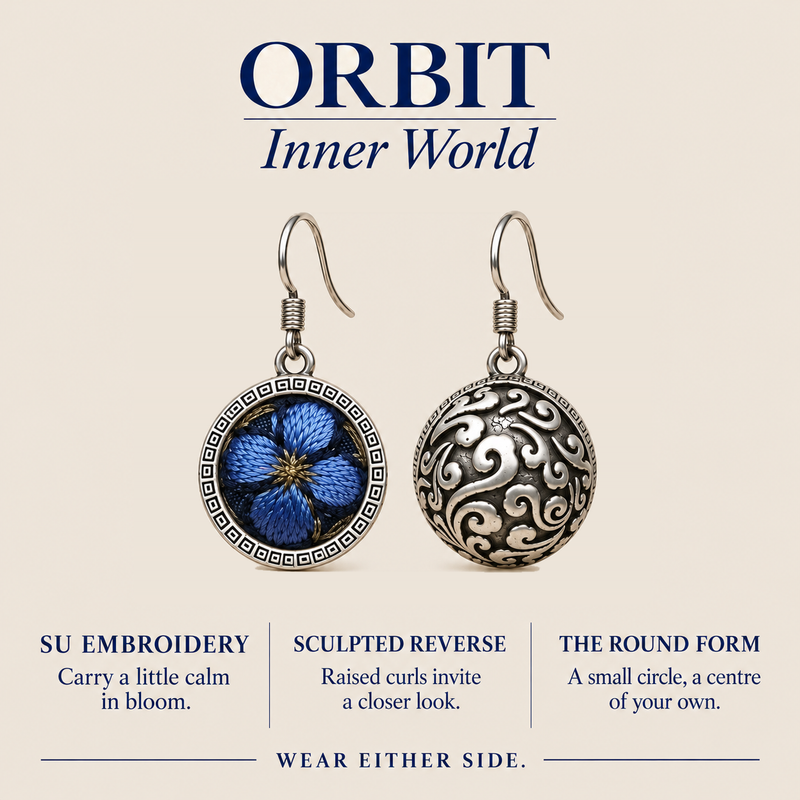 ORBIT Inner World card showing Sapphire Reverie's Suzhou embroidery front and sculpted reverse, with Wear Either Side.