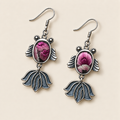 Petal Reverie handmade fish earrings, front flat lay
