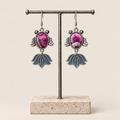 Petal Reverie handmade fish earrings, display