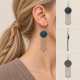 Indigo Canticle earring worn with its indigo batik front facing outward, beside separate front, side and floral reverse views.