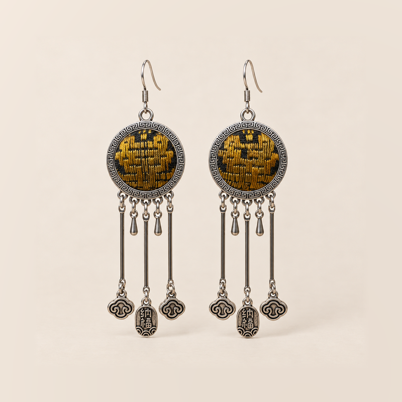 Golden Benediction earrings with golden-yellow geometric embroidery, three long rods, two short drops, cloud charms and central plaques inscribed 纳福.