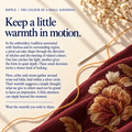 Suzhou embroidery culture card titled Keep a little warmth in motion., beside wine-red cloth with ochre and cream embroidered petals, a needle and golden-colored thread.