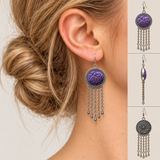 Model with a low twisted bun wearing Violet Cadence earrings, beside front, side and floral reverse views showing the purple geometric design and five chains.