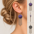 Model with a low twisted bun wearing Violet Cadence earrings, beside front, side and floral reverse views showing the purple geometric design and five chains.