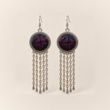 Crimson Confluence earrings with dark purple-black layered fabric and red and magenta folded edges in round frames, each with five long oval-link chains and teardrop ends.