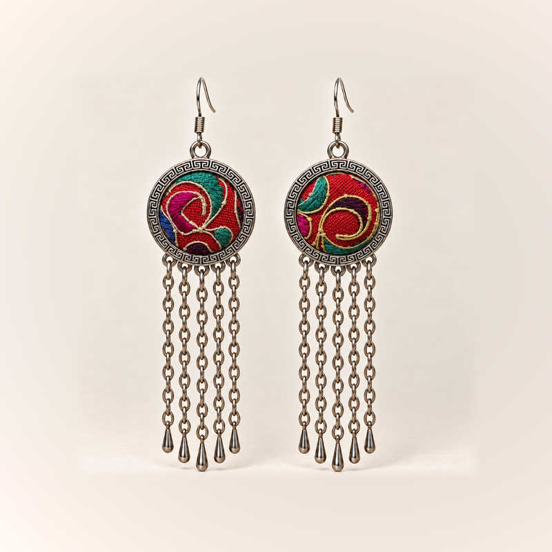 Scarlet Affinity earrings with red Horsehair Embroidery fronts, teal and magenta curves, pale raised outlines and five long chains with teardrops.
