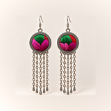 Rose Chorus earrings with bold green and rose-pink Songtao Embroidery, red accents, patterned circular rims and five long chains ending in teardrops.