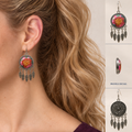 Model wearing Garden Murmur earrings with a high ponytail and plum square-neck top, beside full front and back views and a shell profile detail.