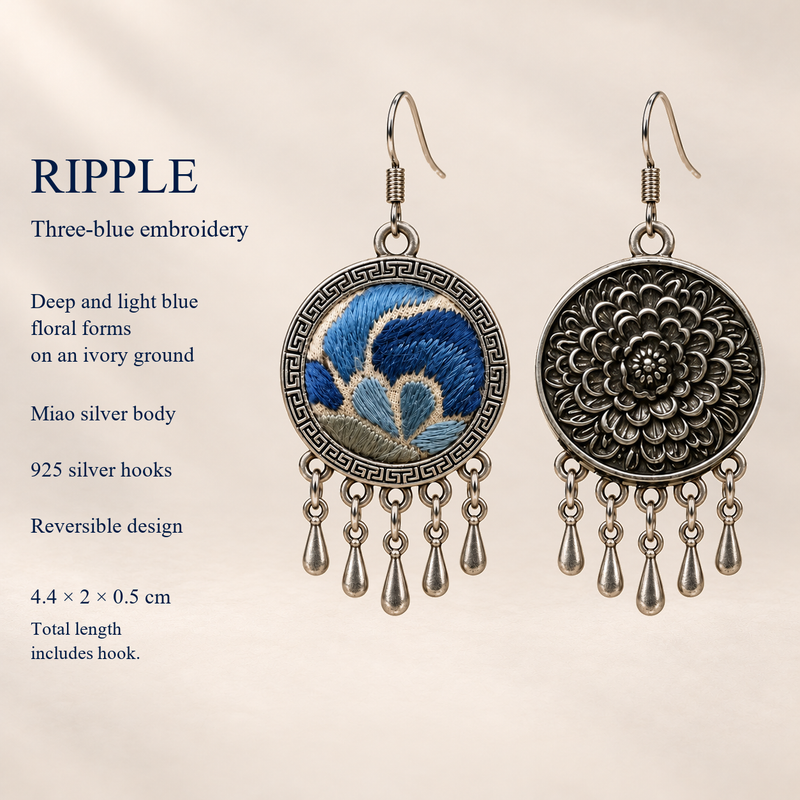 Azure Harmony detail card with blue embroidered front, floral reverse, 925 silver hooks and 4.4 by 2 by 0.5 cm dimensions including hook.