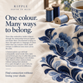 Three-Blue Embroidery culture illustration with blue floral stitching on cream cloth, three blue thread spools and a blue-and-white patterned cup.