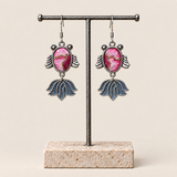 Rose Harmony handmade fish earrings, display