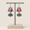 Rose Harmony handmade fish earrings, display
