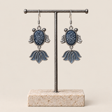 SAYRUE CURRENT earrings on display