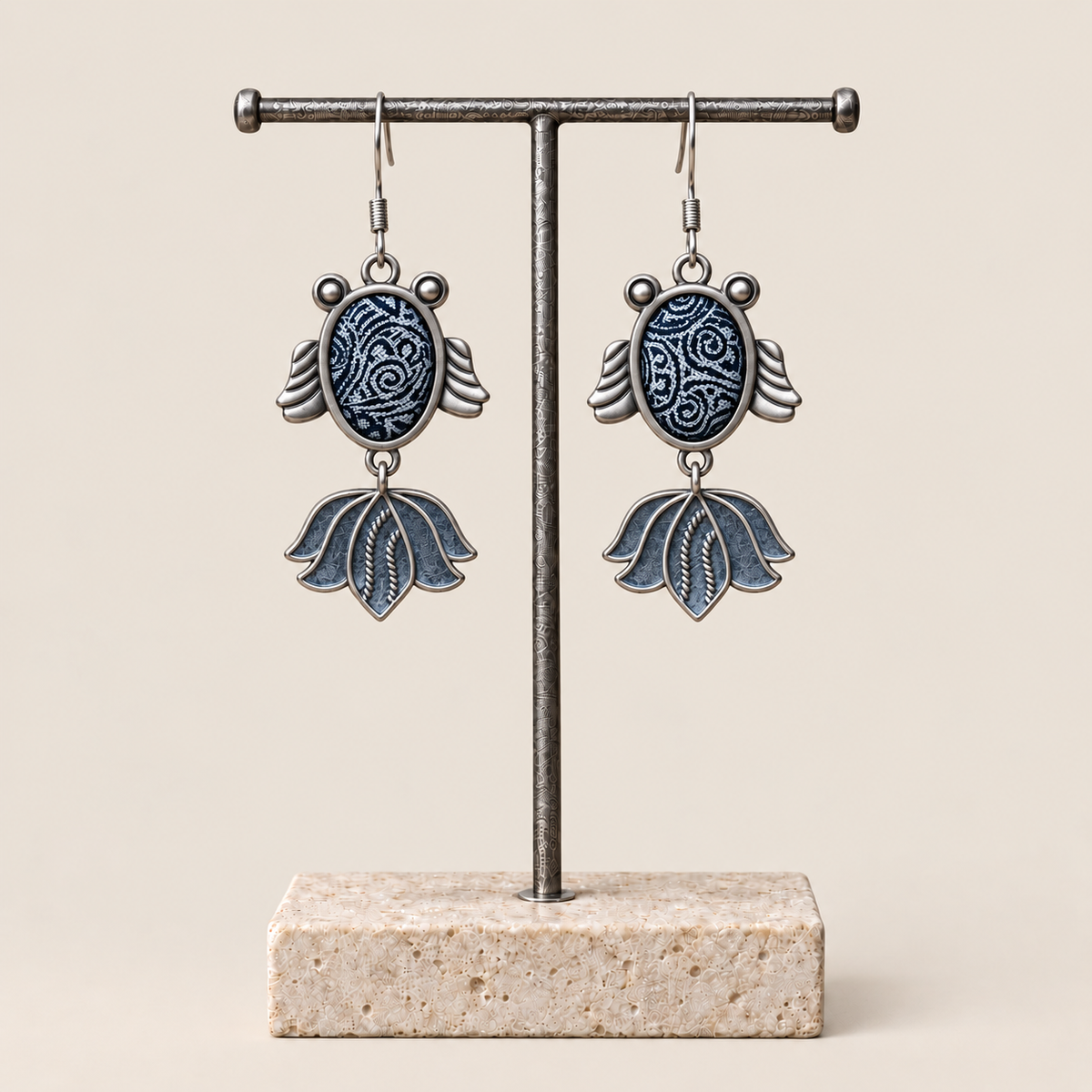 SAYRUE CURRENT earrings on display