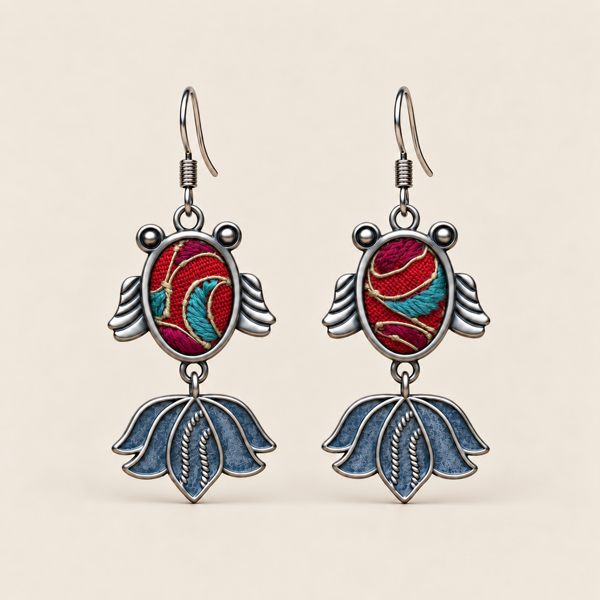 Scarlet Reverie handmade fish earrings with red and teal Horsehair Embroidery, front view
