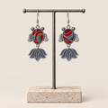Scarlet Reverie handmade fish earrings, display